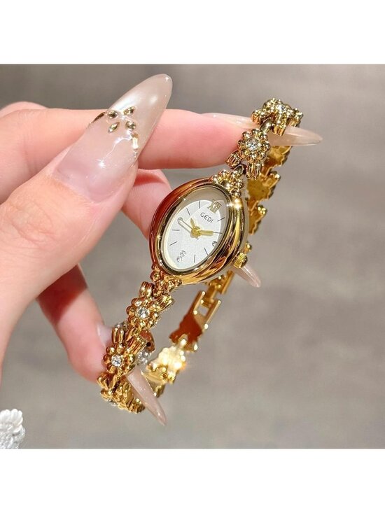 Women Gold And White Analog Quartz Alloy Steel Oval Roman Numeral Bracelet Watch